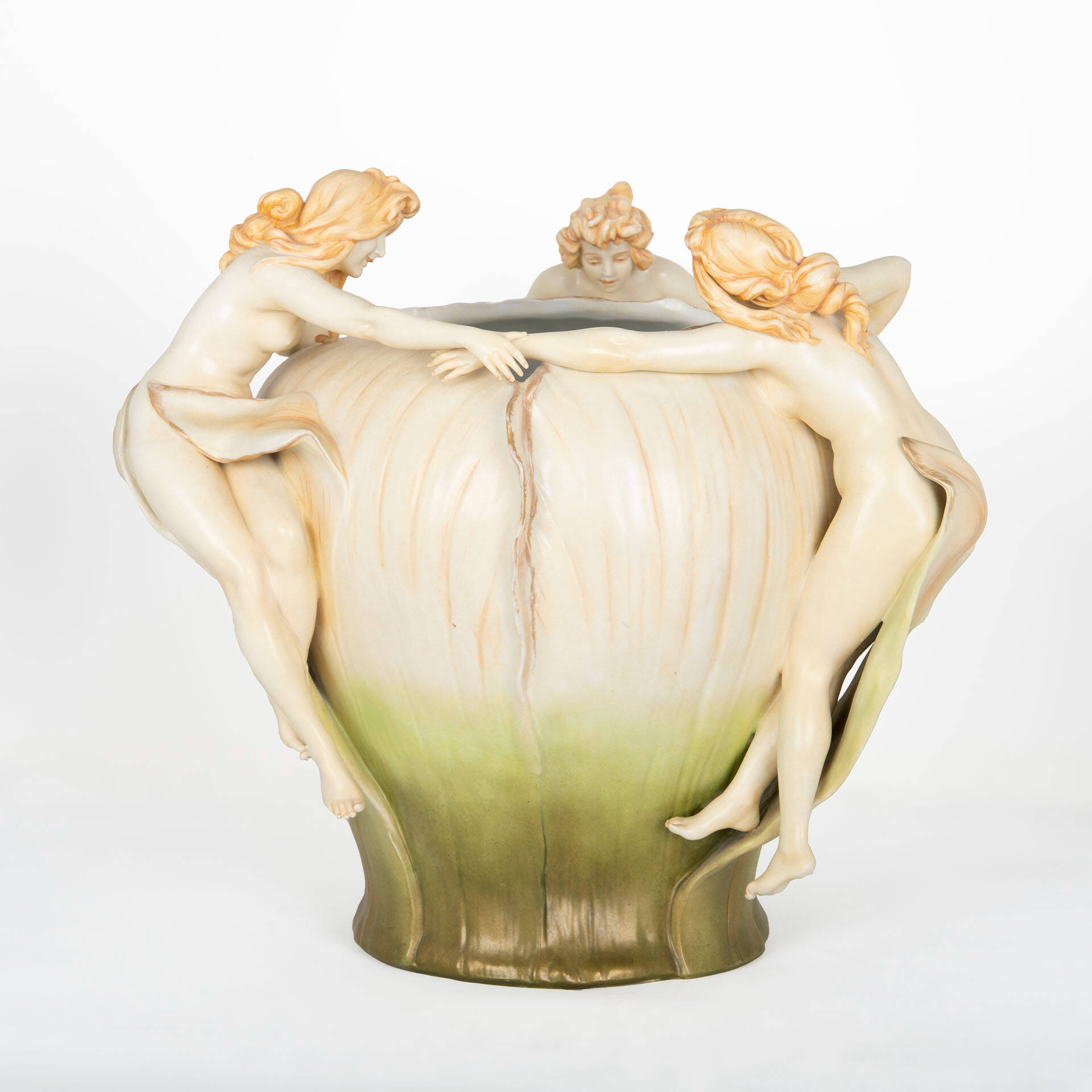 A bowl with women holding hands and dancing around the bowl. The farther down the bowl the color gets greener and darker.